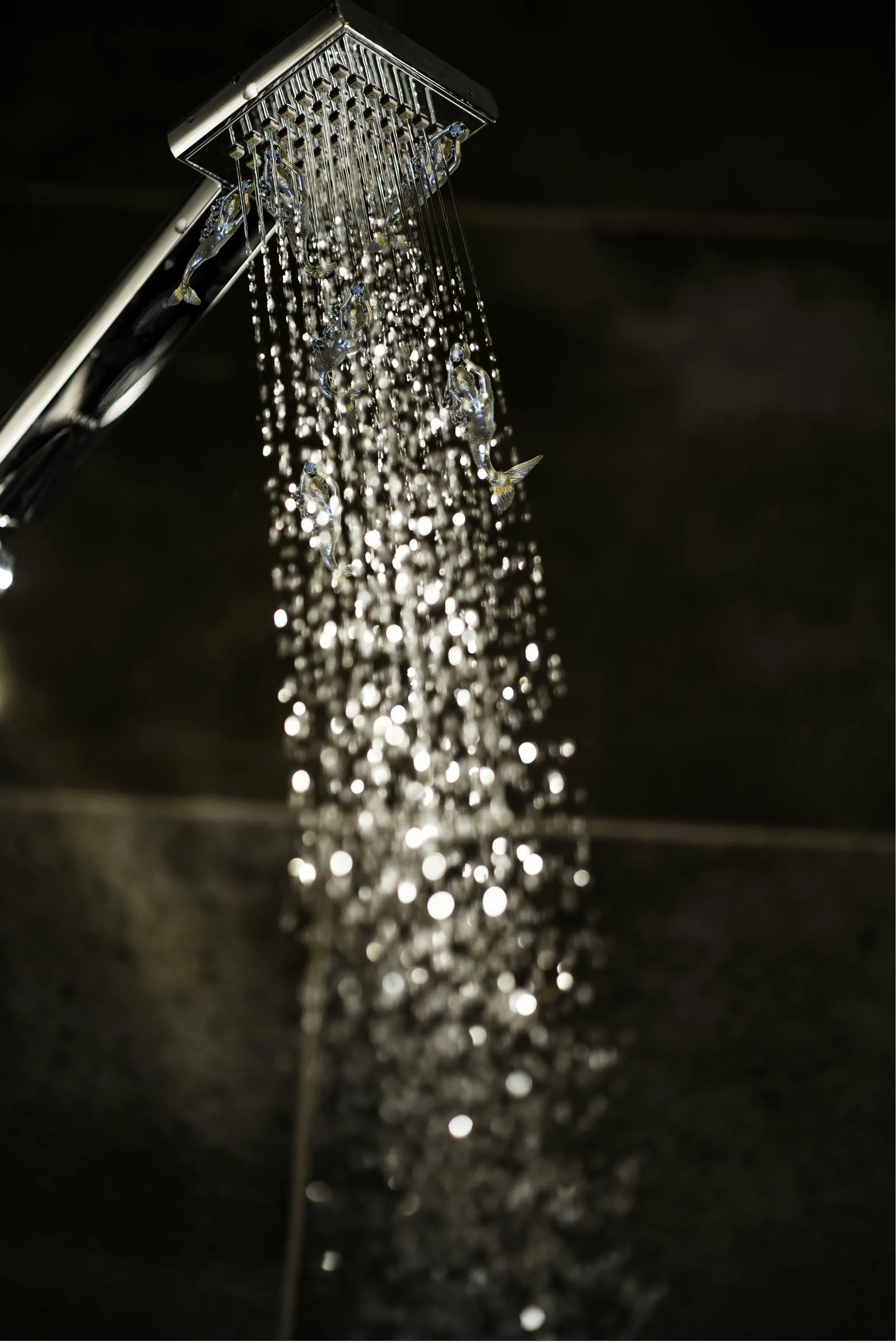 Water droplets on a clean glass surface catching the light